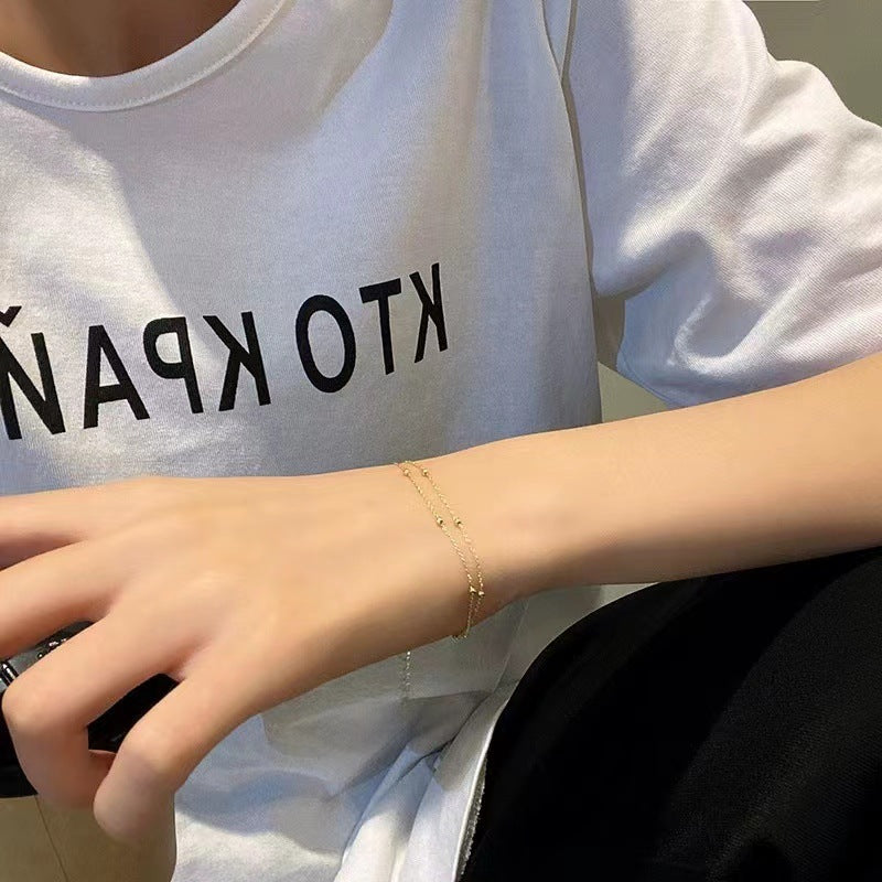 Double-layered lucky bead bracelet Anklet women's high-fashion, simple, individual, versatile, high-end niche bracelet