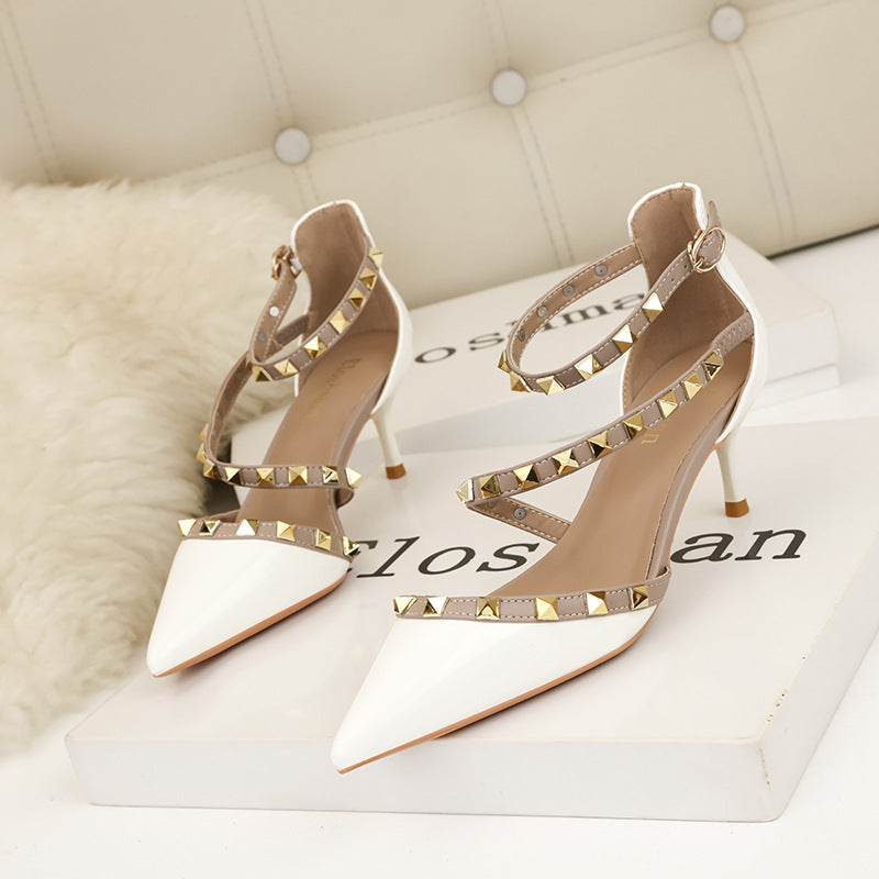 1138-13 European and American simple sexy nightclub stiletto high heels shallow mouth pointed toe rivet hollow sandals with a word